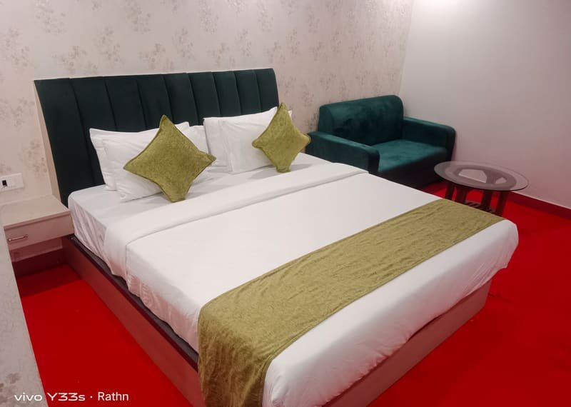 A boat house interior with bed, sofa and side table